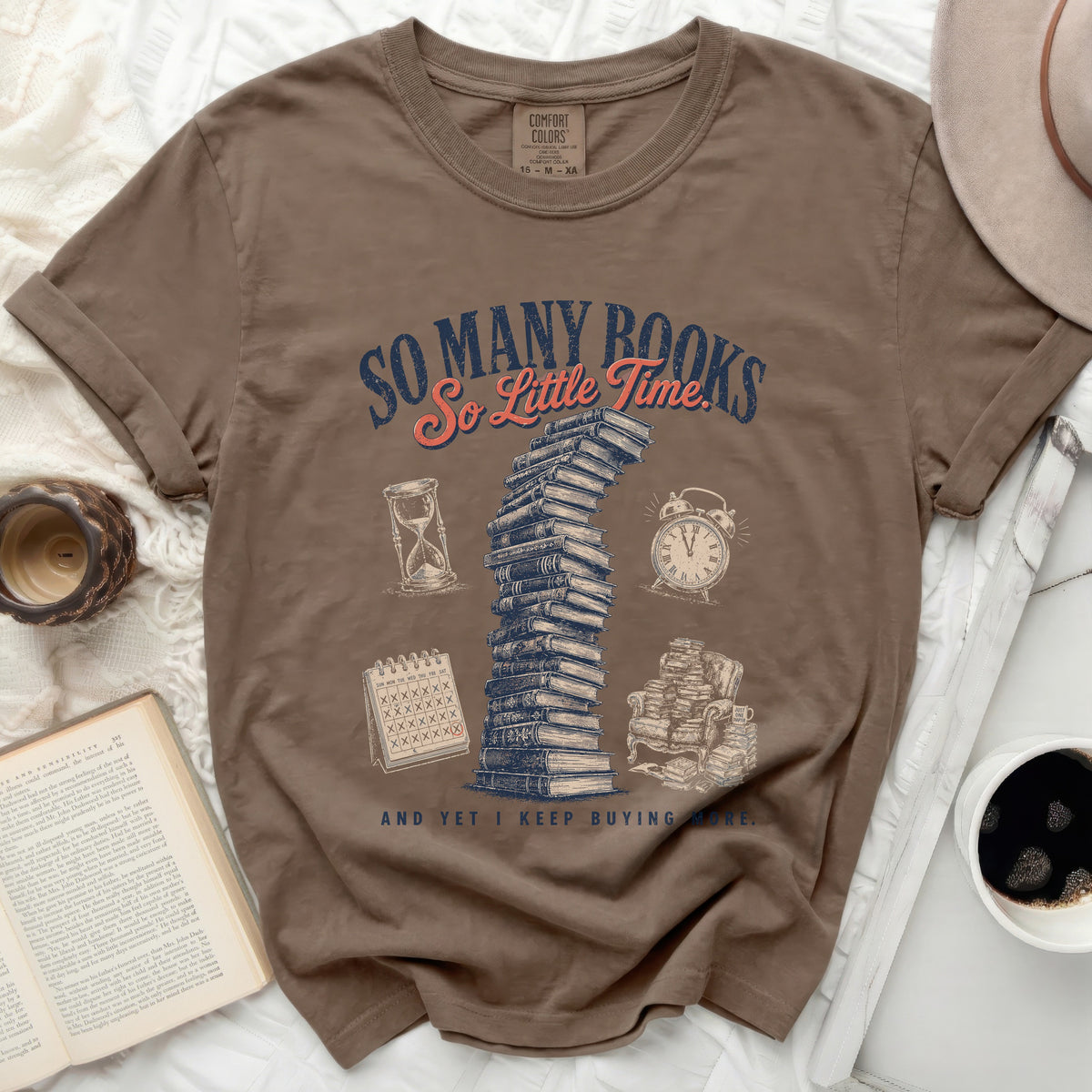 Brown t-shirt with "So Many Books, So Little Time" and stack of books.
