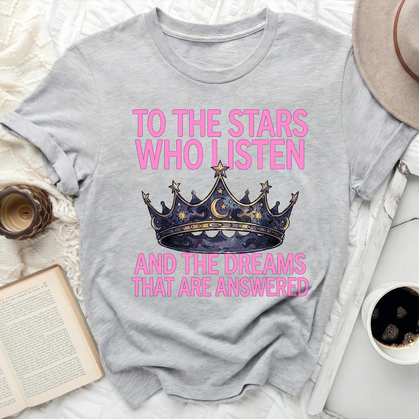 To The Stars Who Listen And Dreams That Are Answered product type
Stars Who Listen
Dreams Answered
Celestial Crown
Inspirational Quote
Fantasy Lover
Bookish Tee
Magical Design
Moon Stars
Crown Graphic
Empowerment Shirt
Unique Apparel
Wish Fulfillment
Positive Message
Unisex Tee
Graphic TShirt
Statement Top
Gift Idea
Aesthetic Clothing
Literary Inspired
Dreamer's Gear