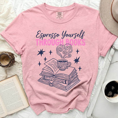 Pink t-shirt with "Espresso Yourself Through Books" graphic and coffee cup.