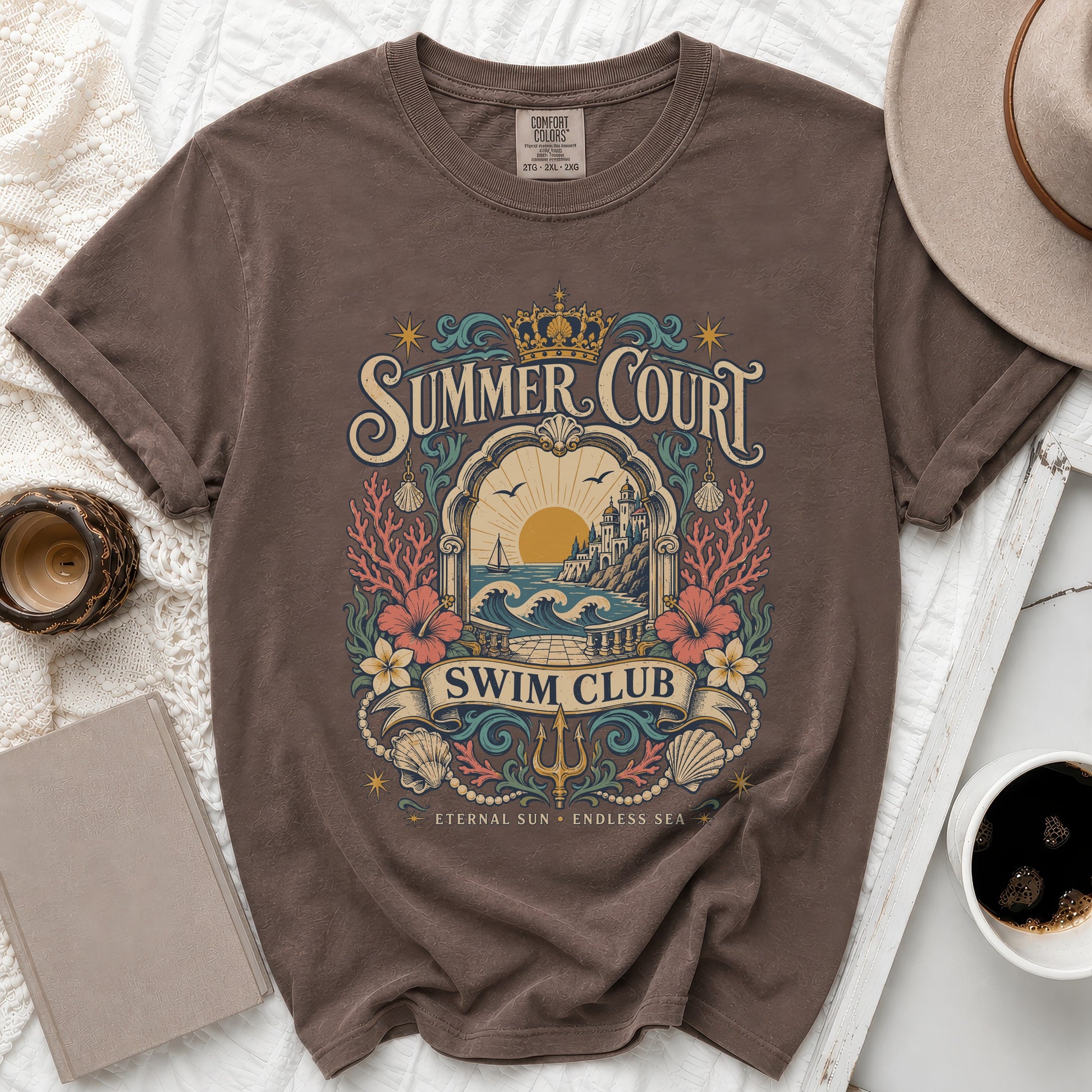 Brown t-shirt with "Summer Court Swim Club" vintage beach graphic and text.