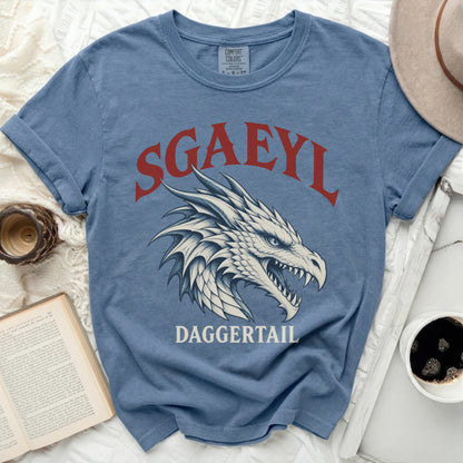 Blue t-shirt with SGAEYL and DAGGERTAIL text and dragon graphic.