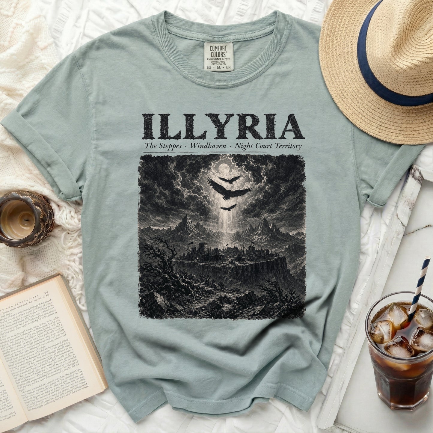 T-shirt with "ILLYRIA The Steppes Windhaven Night Court Territory" print.