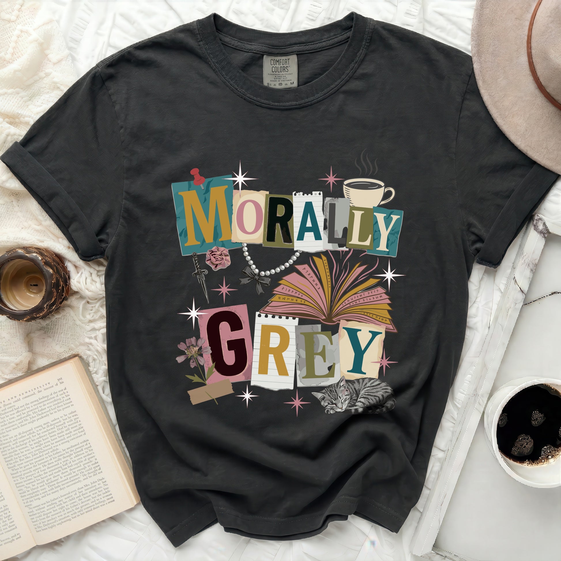 Dark grey t-shirt with "Morally Grey" graphic, book, and cat.