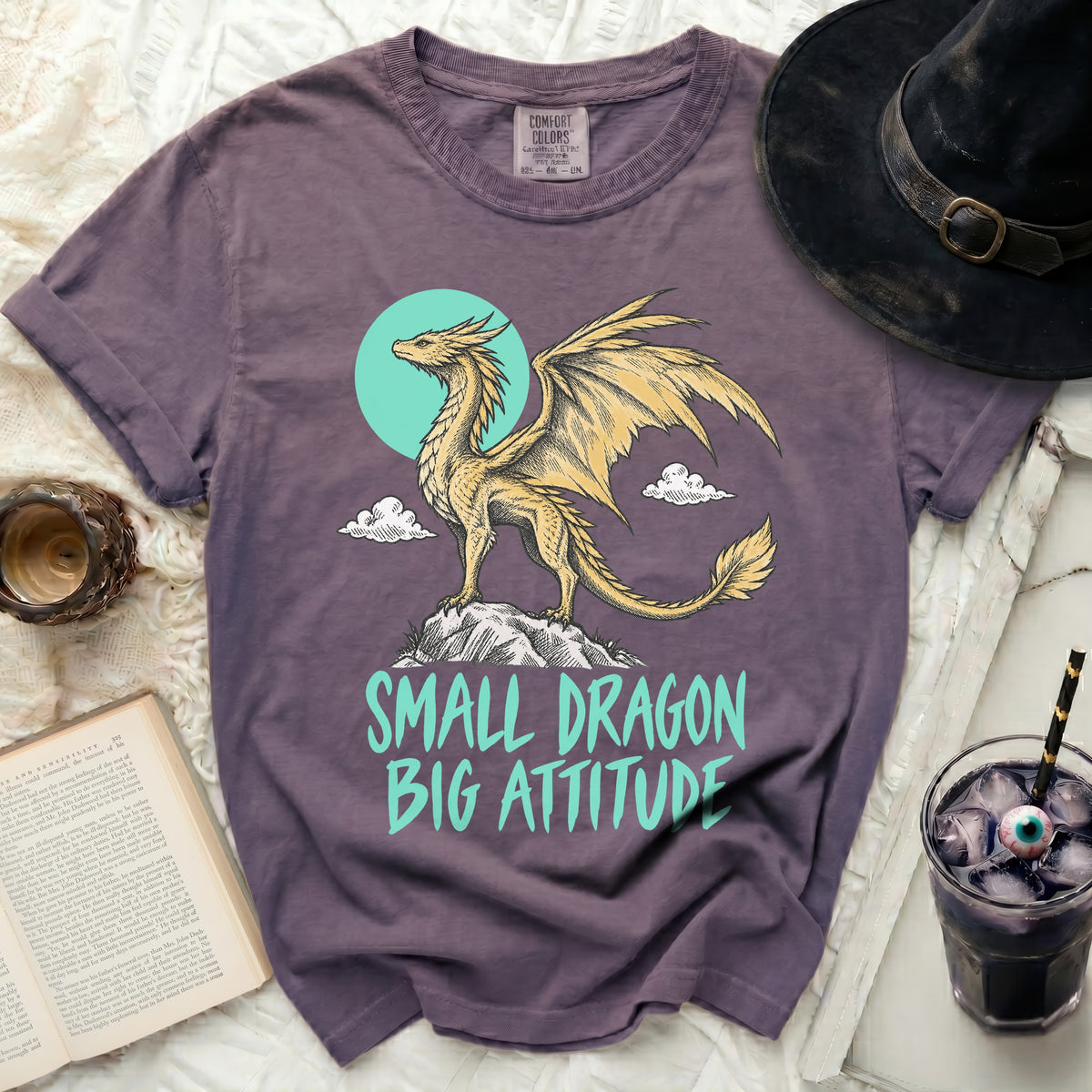 Purple t-shirt with a gold dragon and text "SMALL DRAGON BIG ATTITUDE".