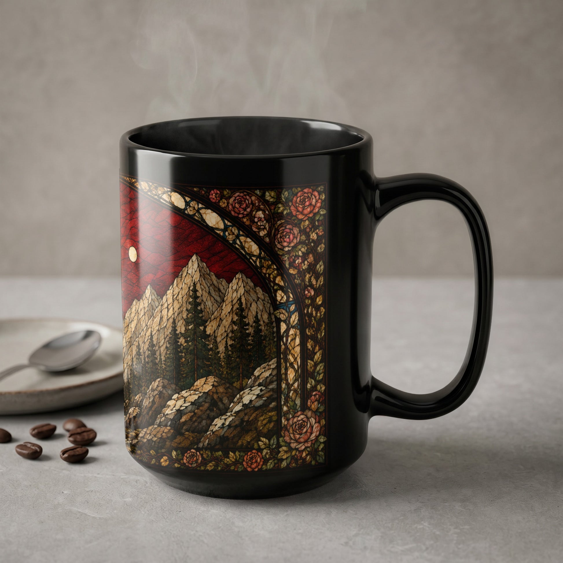 Black mug with stained glass art of mountains, moon, and roses.