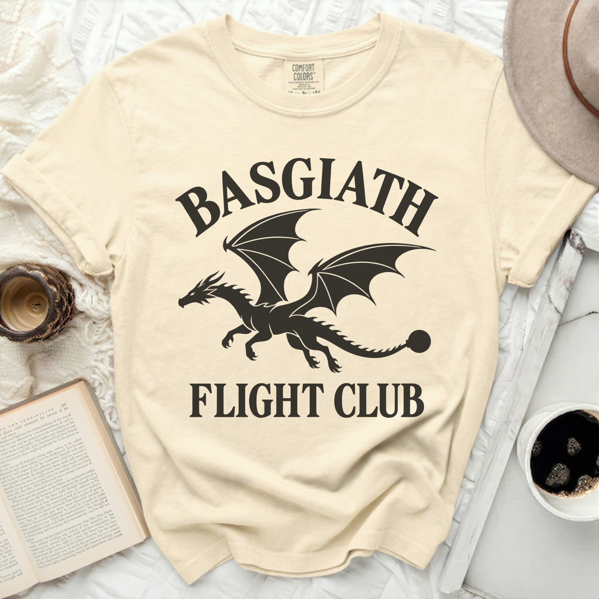 Cream t-shirt with black dragon graphic and text "Basgiath Flight Club."