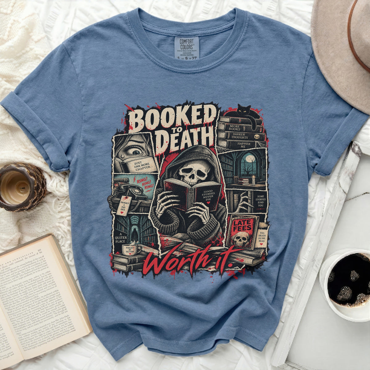 Shirt graphic with grim reaper reading, books, and text "Booked to Death" and "Worth it."