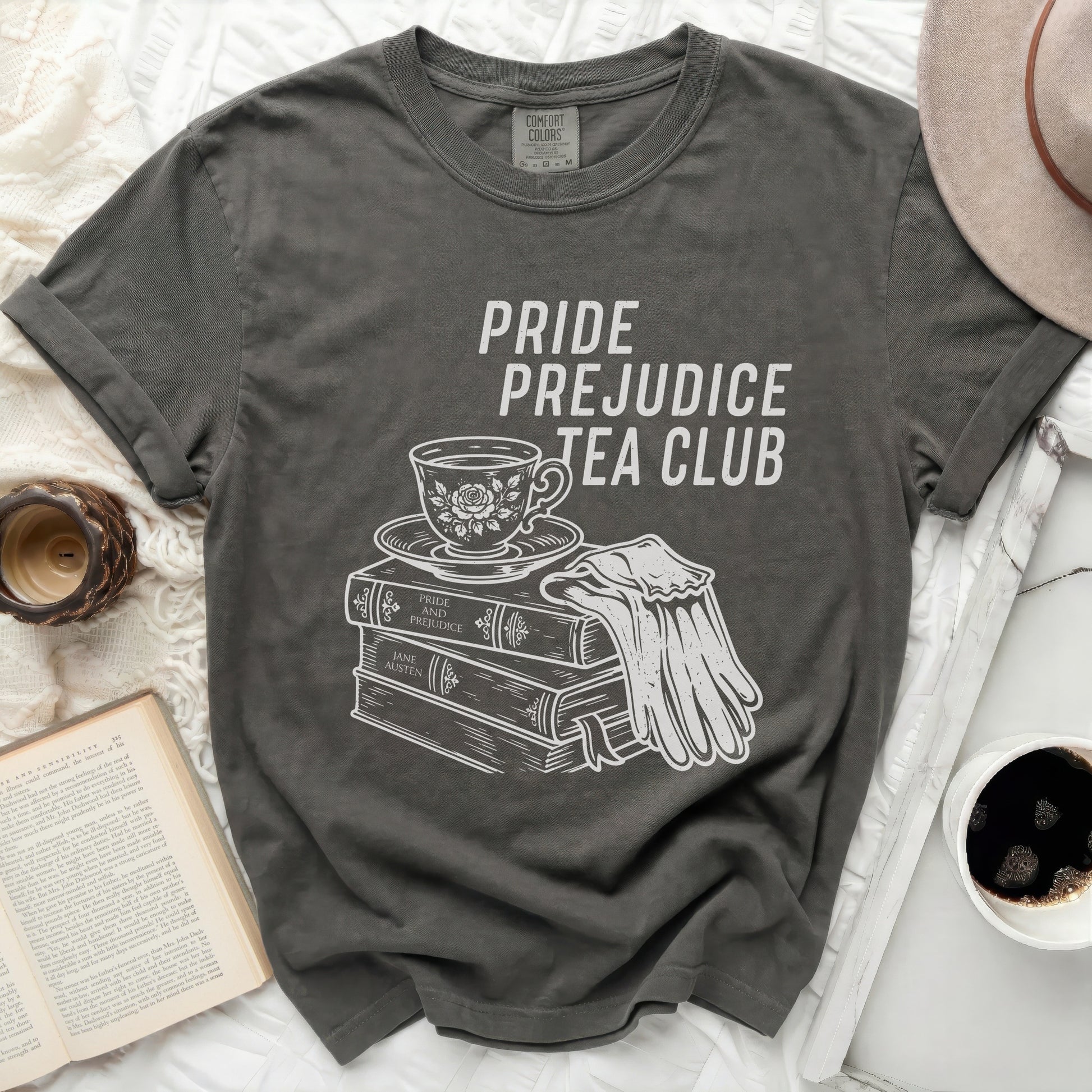 Pride and Prejudice Tea Club graphic on a charcoal t-shirt.