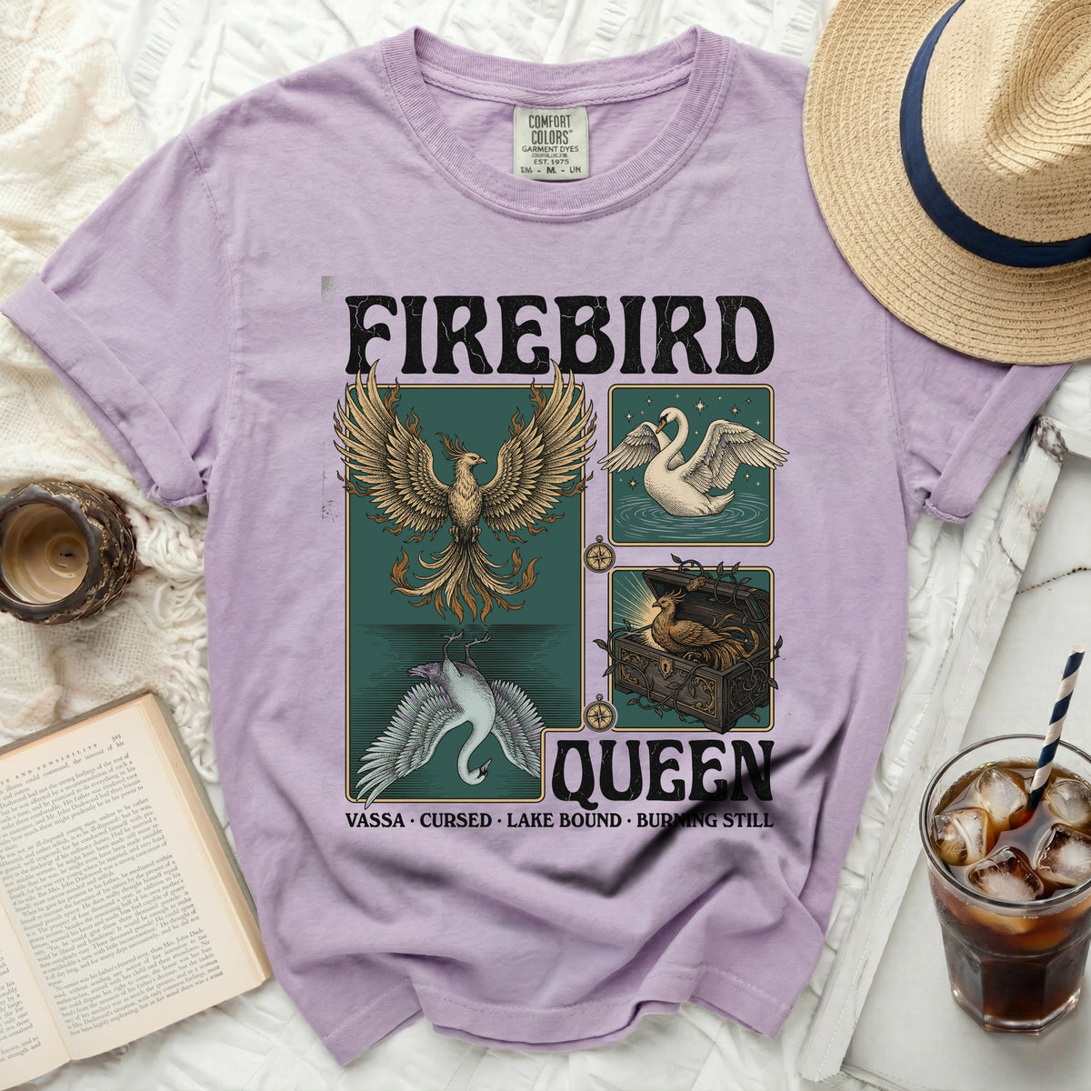 Lilac t-shirt with "Firebird Queen" graphic and avian illustrations.