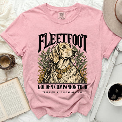 Pink t-shirt with golden retriever, "FLEETFOOT GOLDEN COMPANION TOUR TERRASEN THRONE OF GLASS" text.