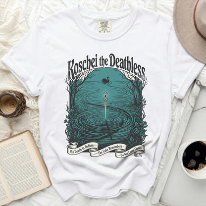 White t-shirt with "Koschei the Deathless" graphic and banner text.
