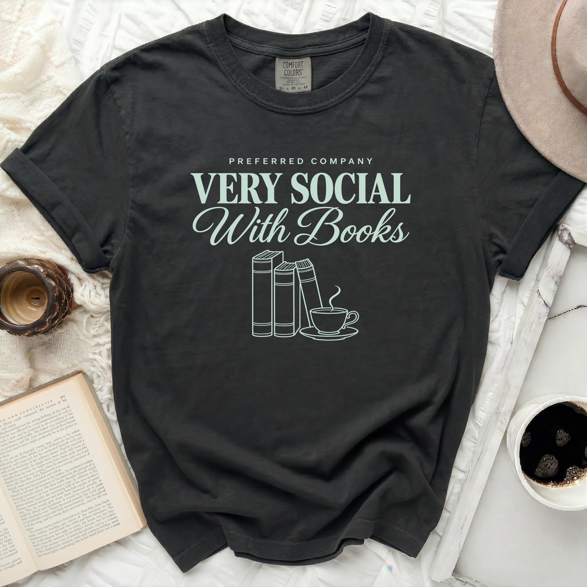 Dark gray t-shirt with "VERY SOCIAL With Books" text and book graphics.