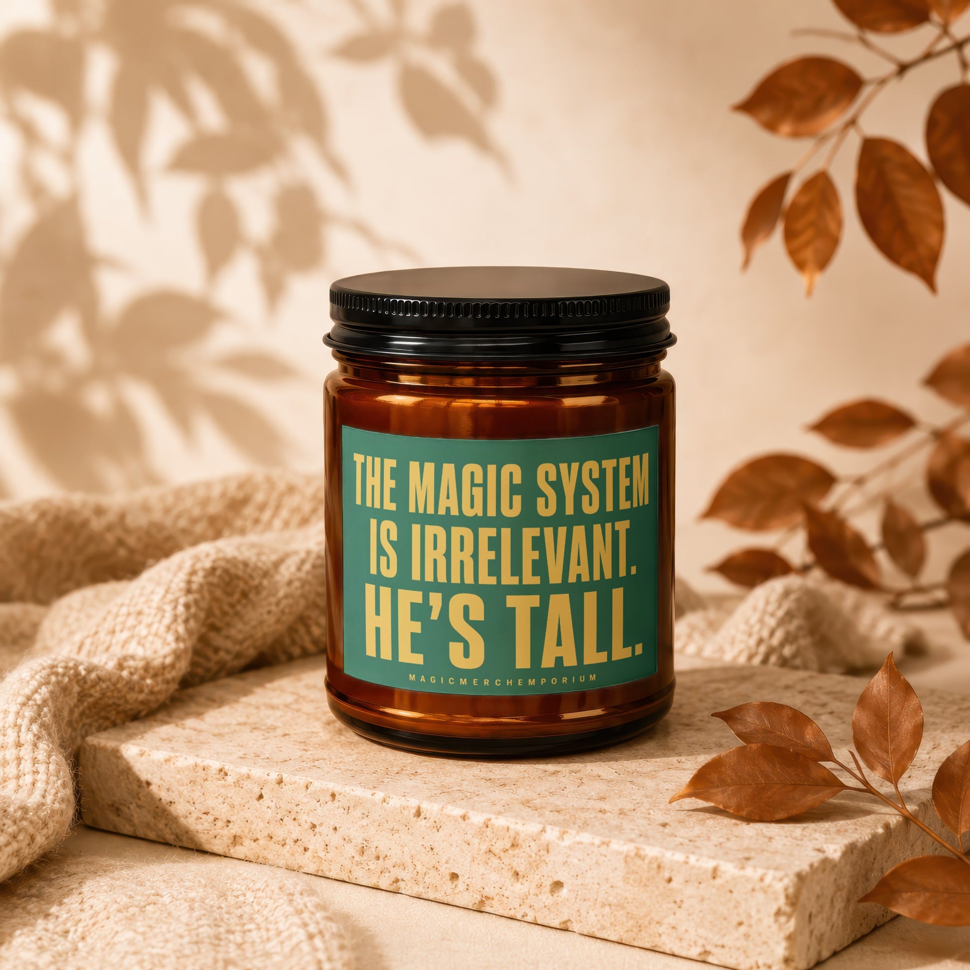Candle with text "The magic system is irrelevant. He's tall."