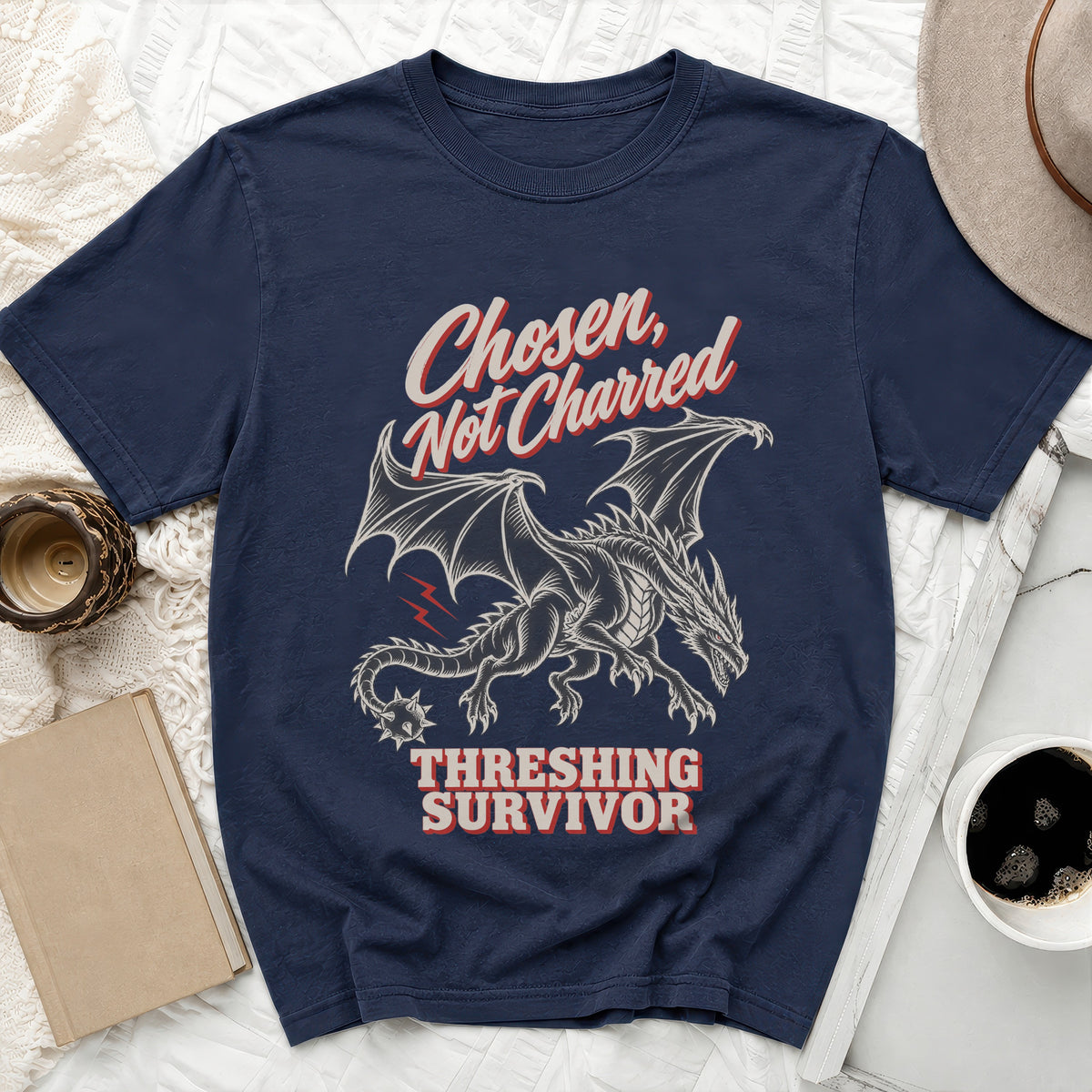 Navy t-shirt with a dragon graphic and text "Chosen, Not Charred" and "THRESHING SURVIVOR".