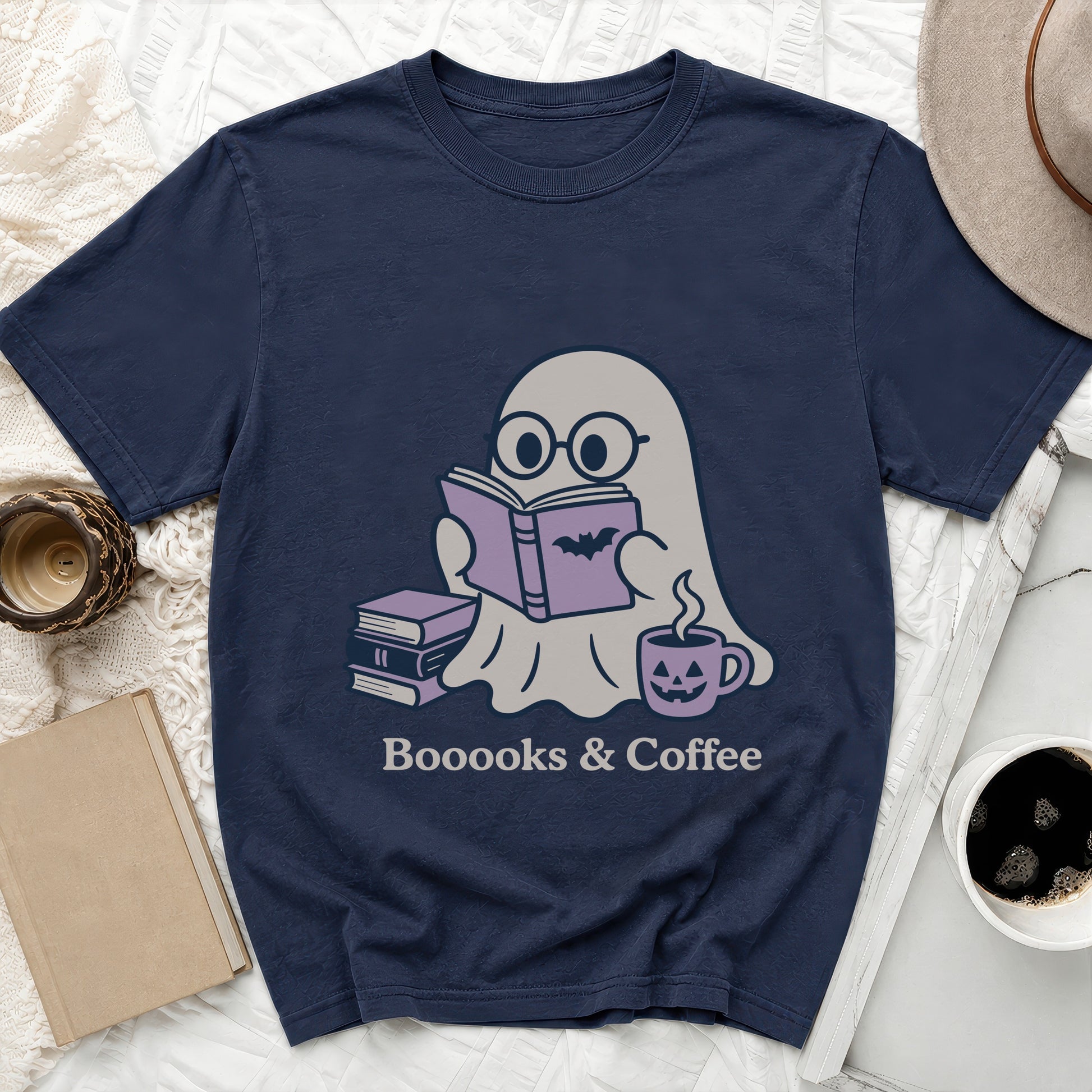 Ghost reading a book with a coffee mug, text reads "Boooooks & Coffee".