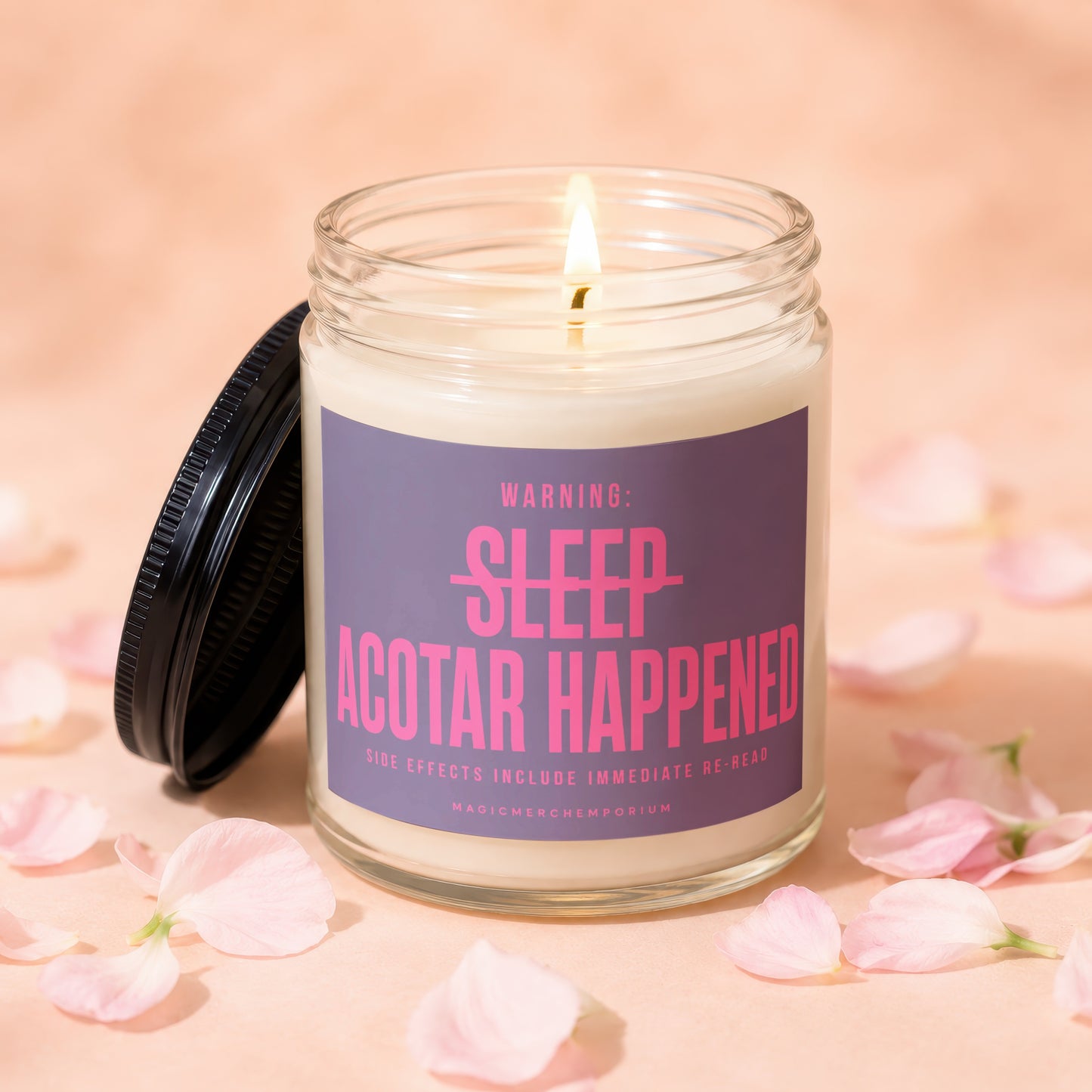 Candle labeled "WARNING: SLEEP ACOTAR HAPPENED. SIDE EFFECTS INCLUDE IMMEDIATE RE-READ."