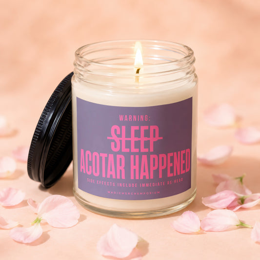 Candle labeled "WARNING: SLEEP ACOTAR HAPPENED. SIDE EFFECTS INCLUDE IMMEDIATE RE-READ."