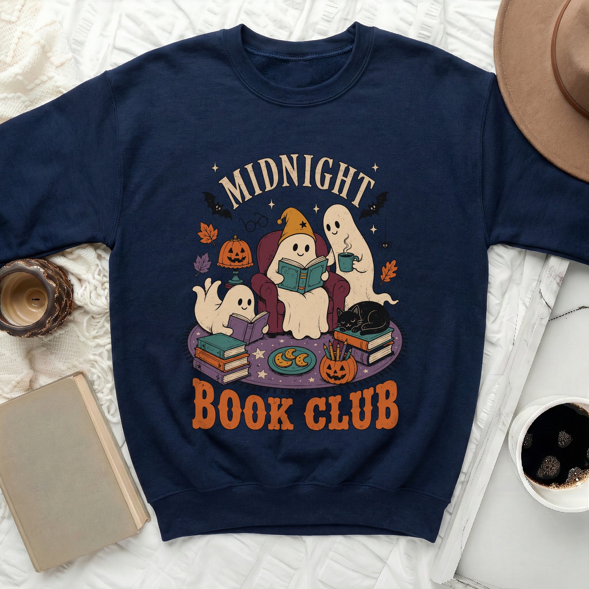 Navy sweatshirt with "Midnight Book Club" text and cartoon ghosts reading.