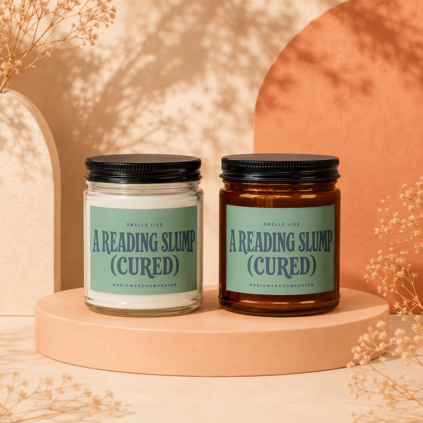 Two candles, one clear, one amber, labeled "A Reading Slump (Cured)".