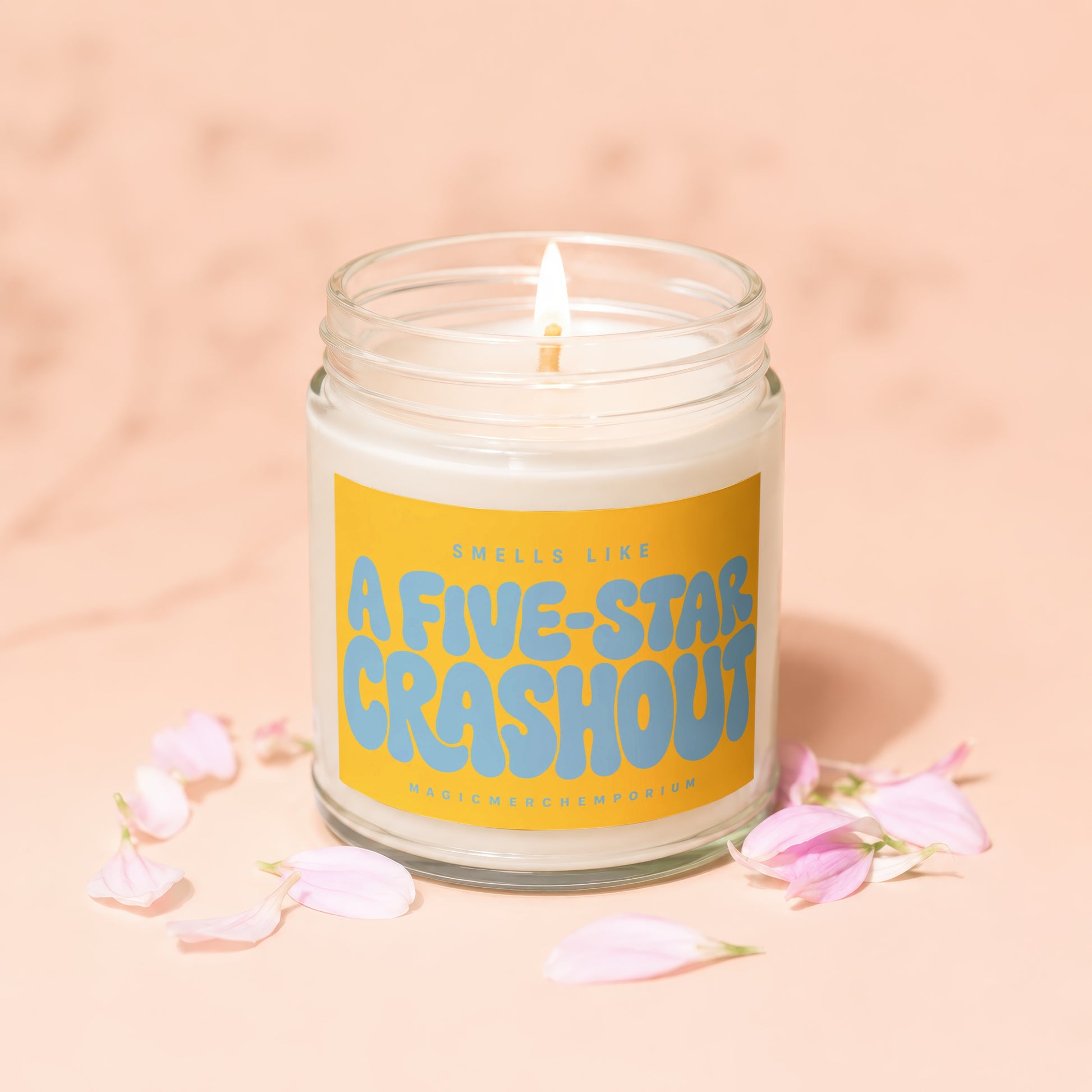 Jar candle with label that says "Smells Like A Five-Star Crashout" and "MagicMerchEmporium"