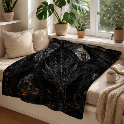 Black dragon artwork on blanket with woman, castle, and fire background.
