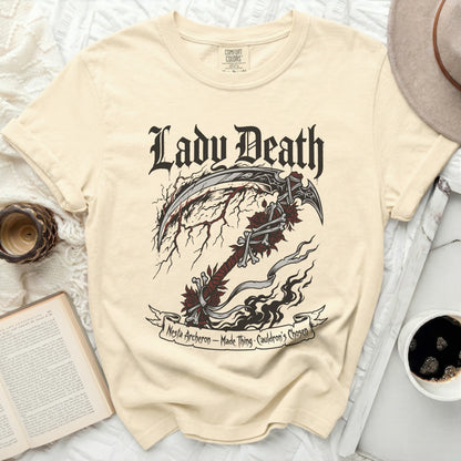 Cream t-shirt with "Lady Death" text and a scythe design.