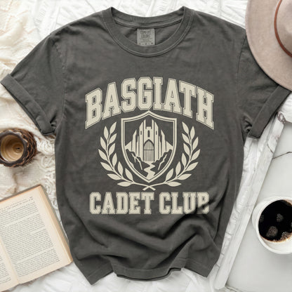Dark gray t-shirt with "Basgiath Cadet Club" text and crest graphic.