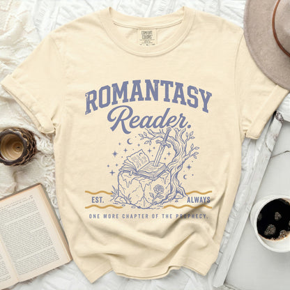 Cream t-shirt with "Romantasy Reader" text, open book, sword, and tree.