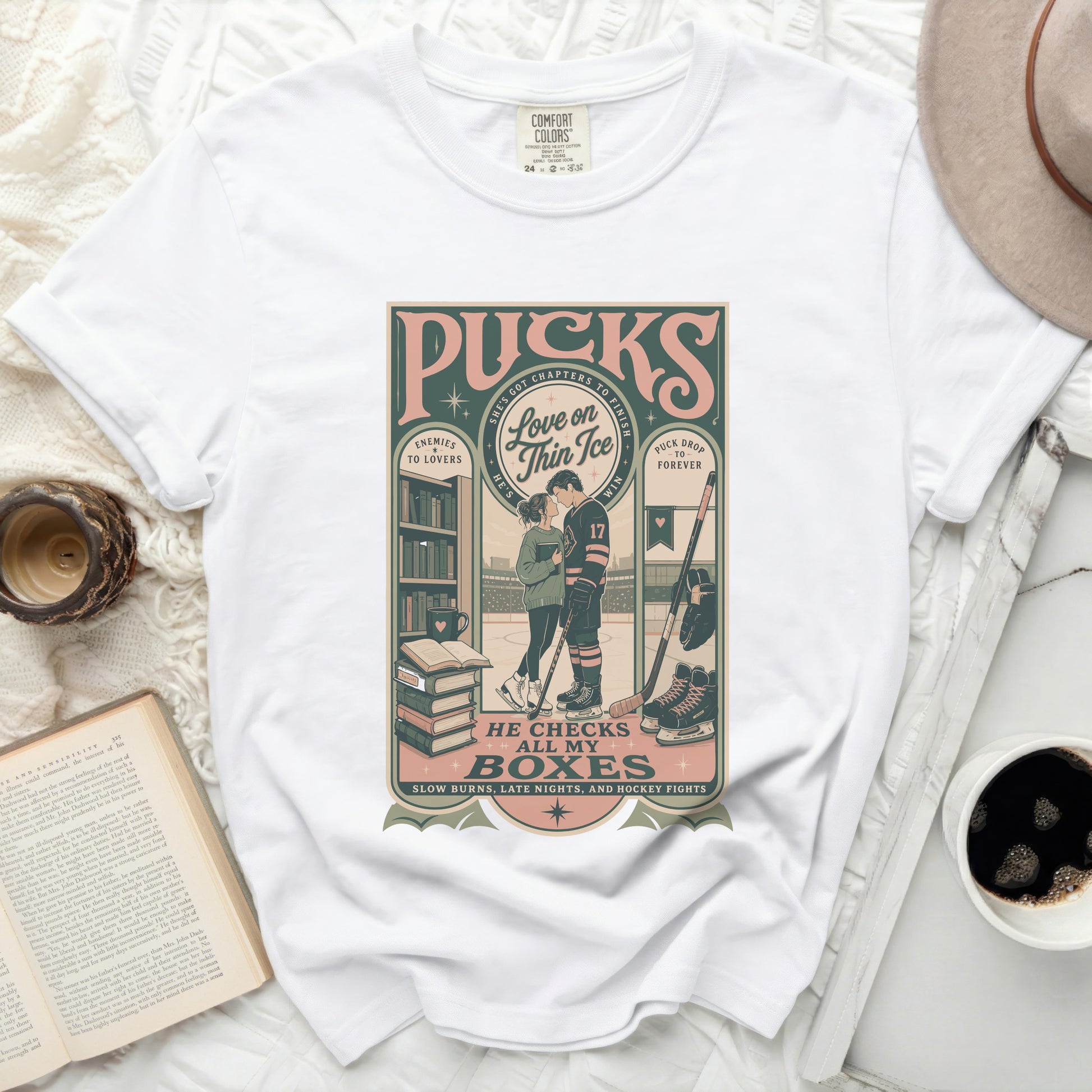 White t-shirt with "Love on Thin Ice" hockey graphic and text.