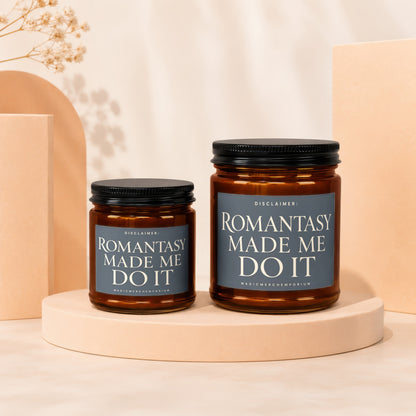 Two amber glass jars with black lids, each labeled "Romantasy Made Me Do It".