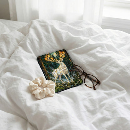 White deer with flame antlers on a dark forest background, with glasses and scrunchie.