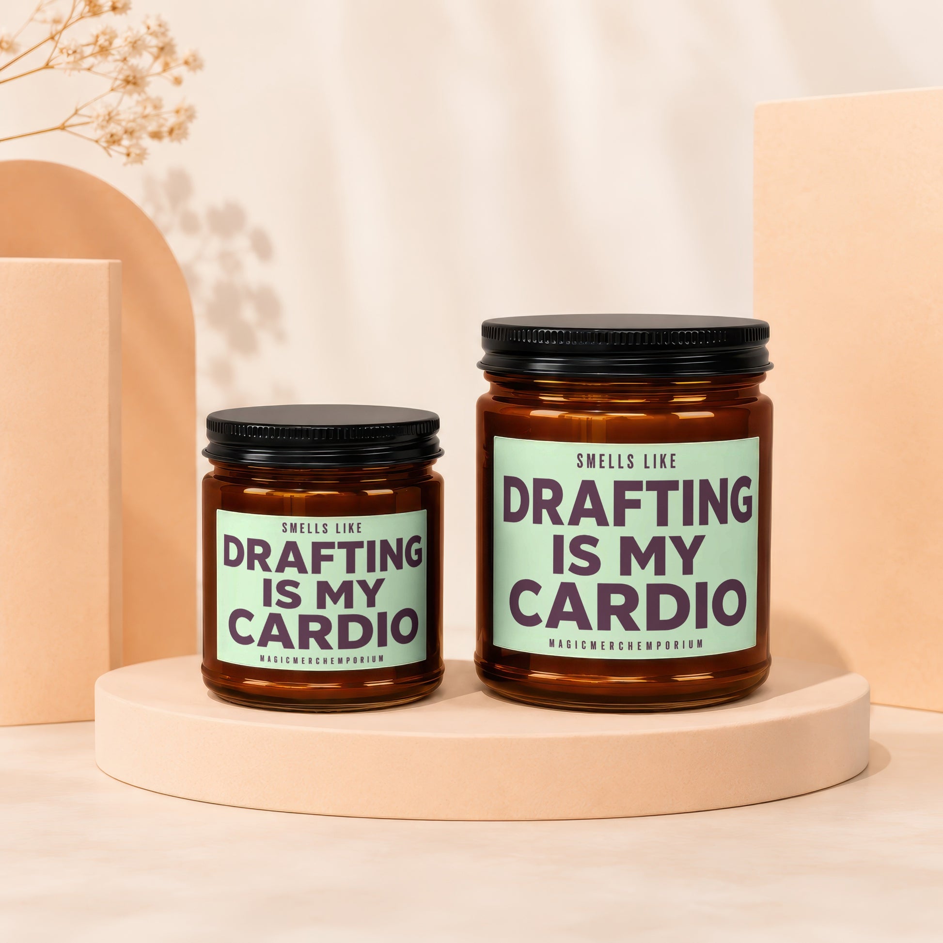 Candles with "Smells Like Drafting Is My Cardio" text on light green labels.