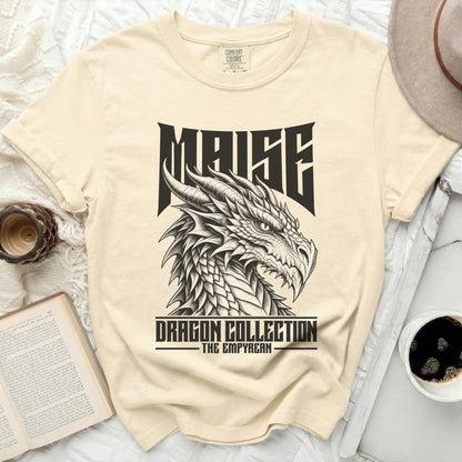 Cream t-shirt with "MAISE DRAGON COLLECTION THE EMPYREAN" text and dragon graphic.