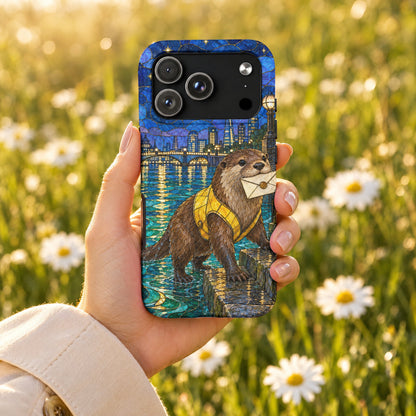 Hand holding a smartphone featuring a stained-glass style case with an otter holding a letter by a city river.