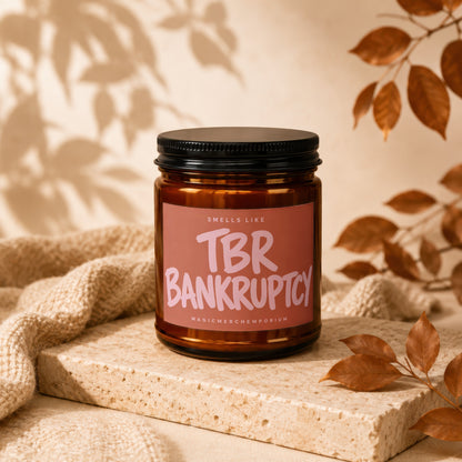 Amber candle with "TBR BANKRUPTCY" text on a peach label.