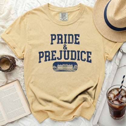 Yellow t-shirt with "PRIDE & PREJUDICE" and a building graphic.