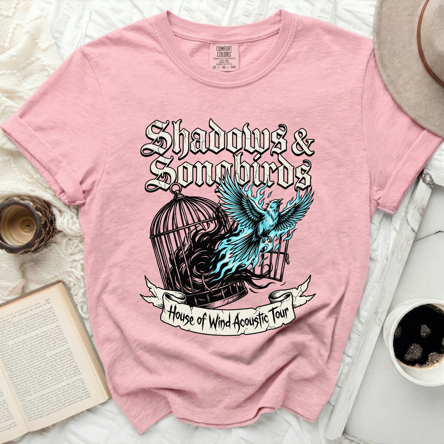 Pink t-shirt with "Shadows & Songbirds House of Wind Acoustic Tour" graphic.