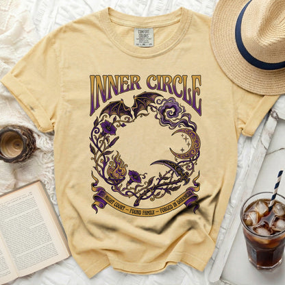 Yellow t-shirt with "Inner Circle" and gothic designs, "Night Court - Found Family - Forged in Darkness."