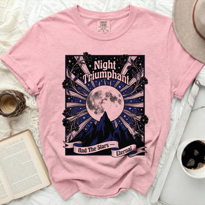 Pink t-shirt with "Night Triumphant And The Stars Eternal" graphic.