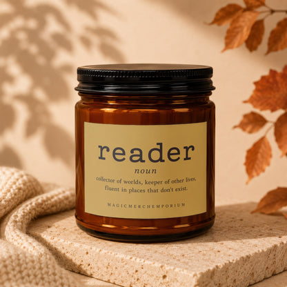 Amber glass candle with a label that reads "reader" and its definition.