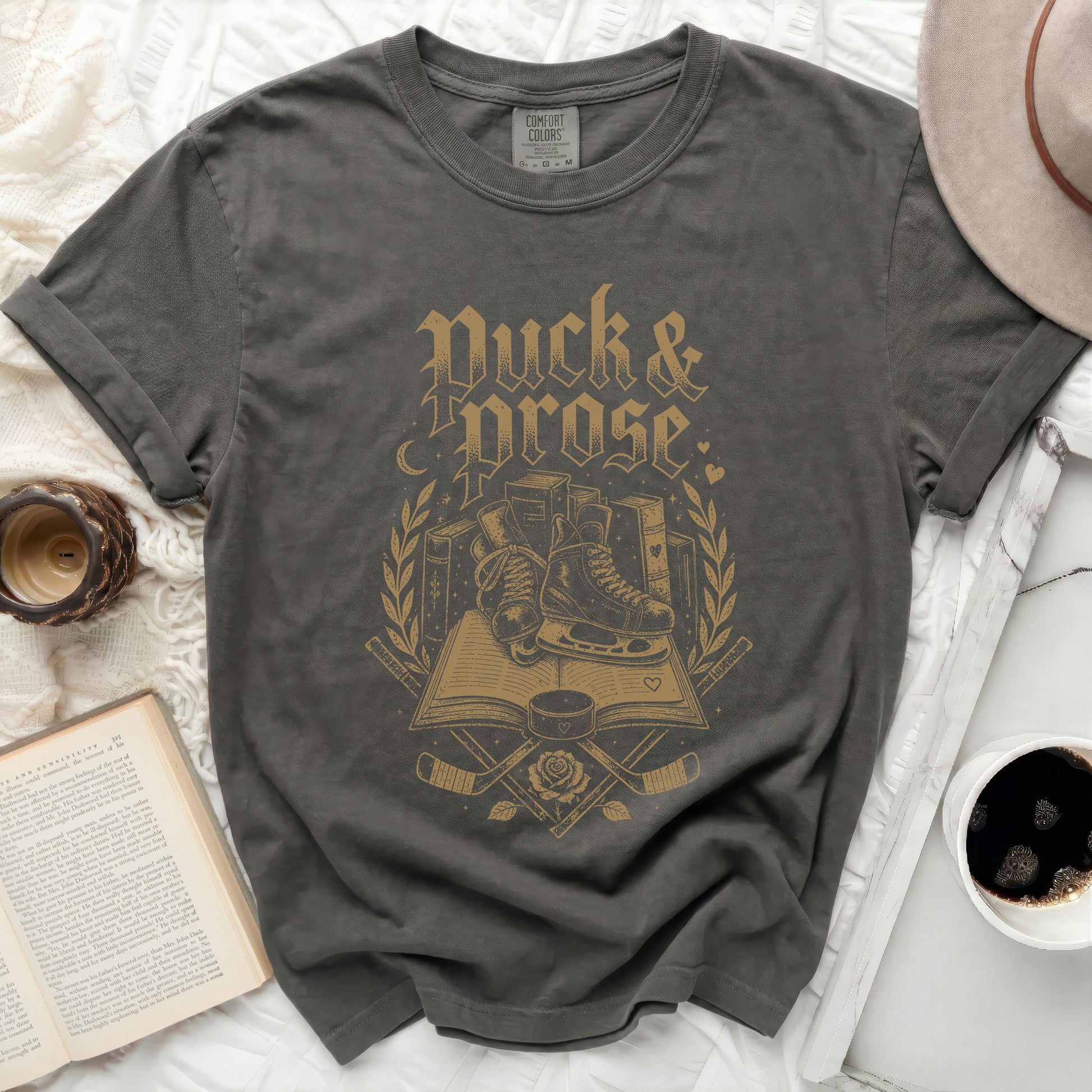 Dark grey t-shirt with "Duck & Prose" text and hockey imagery.