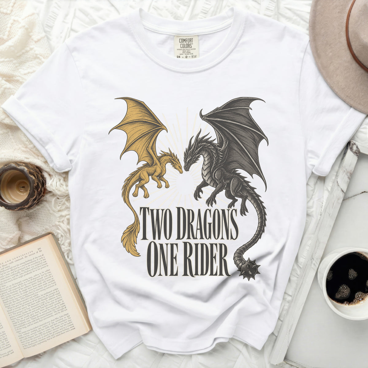 White t-shirt with "Two Dragons One Rider" text and two dragon illustrations.