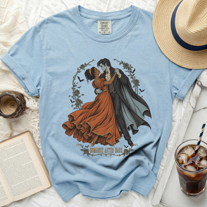 Light blue t-shirt with vampire couple graphic and "Romance After Dark" text.