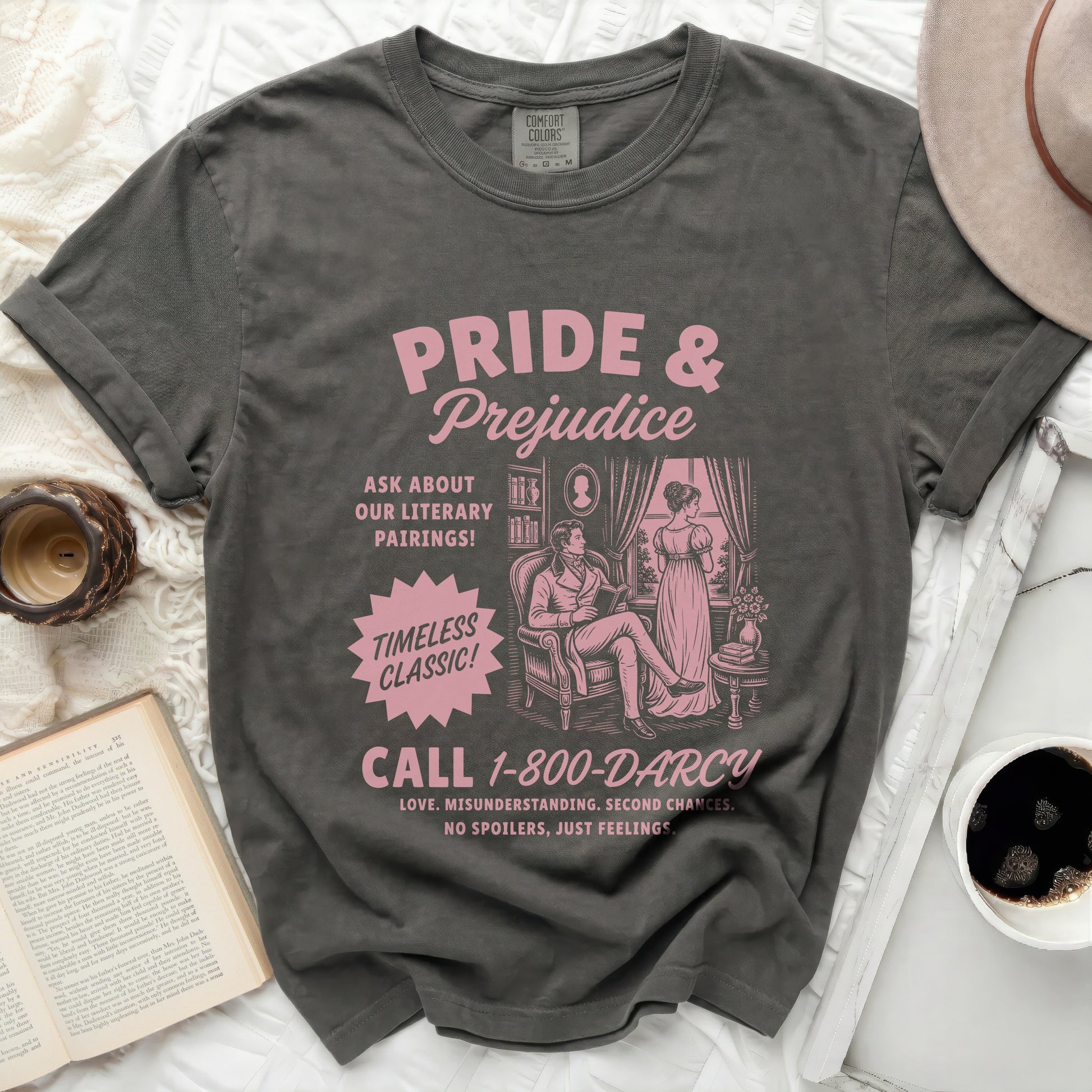 Dark grey t-shirt with "Pride & Prejudice" and literary illustration.
