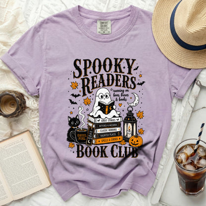 Purple t-shirt with "Spooky Readers Book Club" Halloween graphic design.