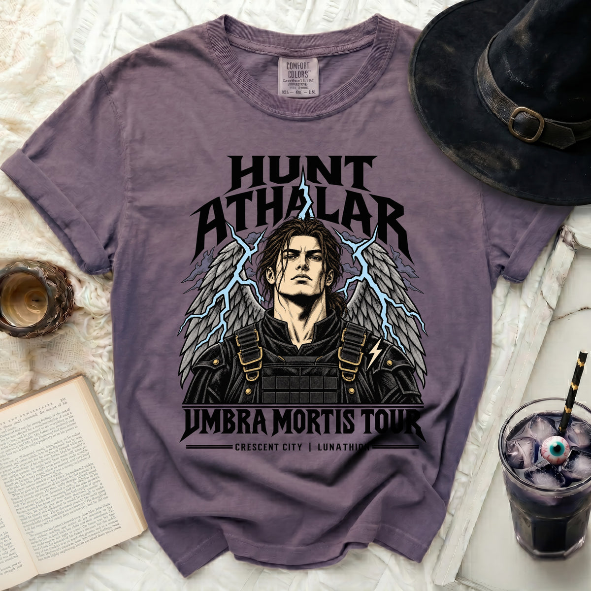Purple t-shirt with Hunt Athalar graphic and "Umbra Mortis Tour" text.