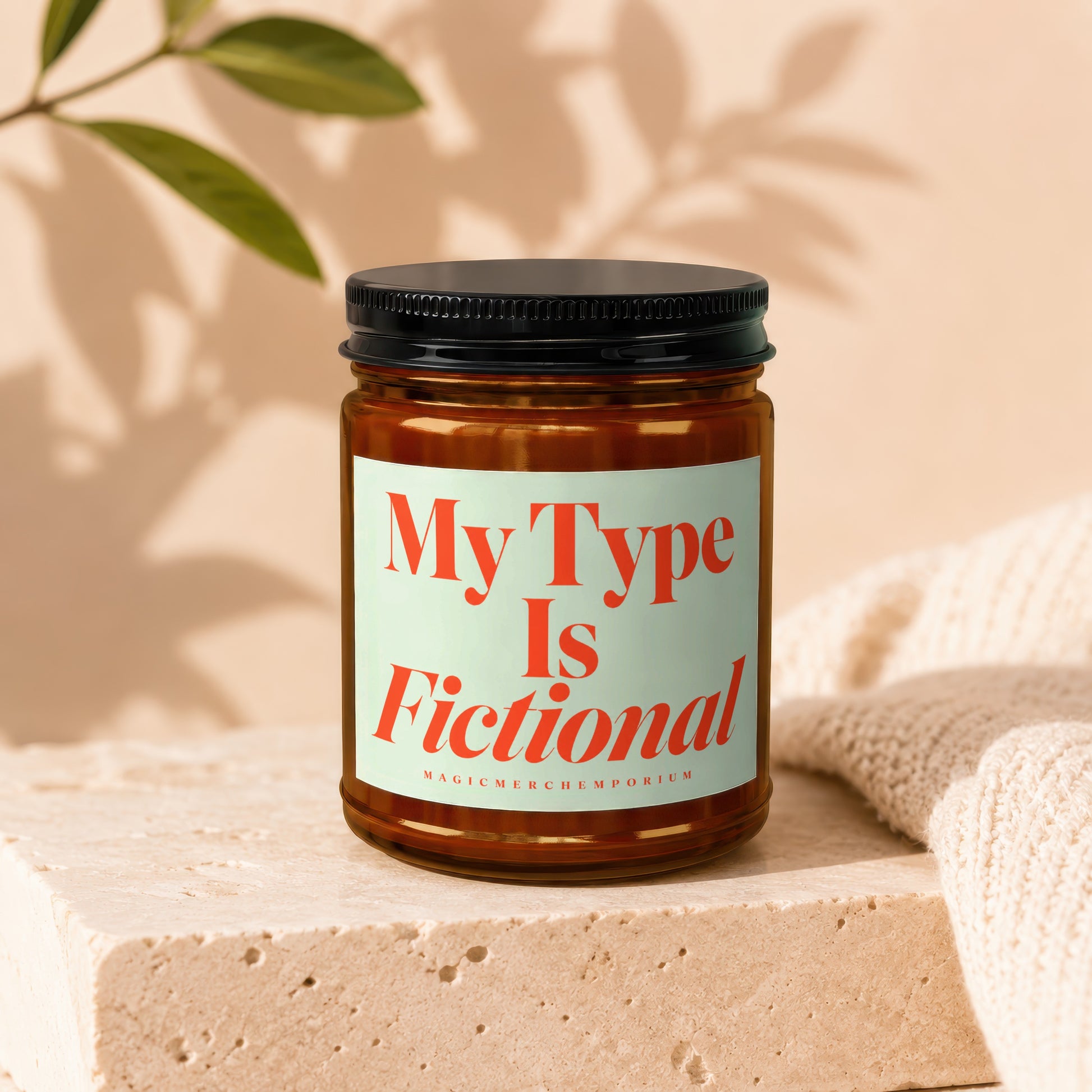 Amber jar candle with black lid, "My Type Is Fictional" text.