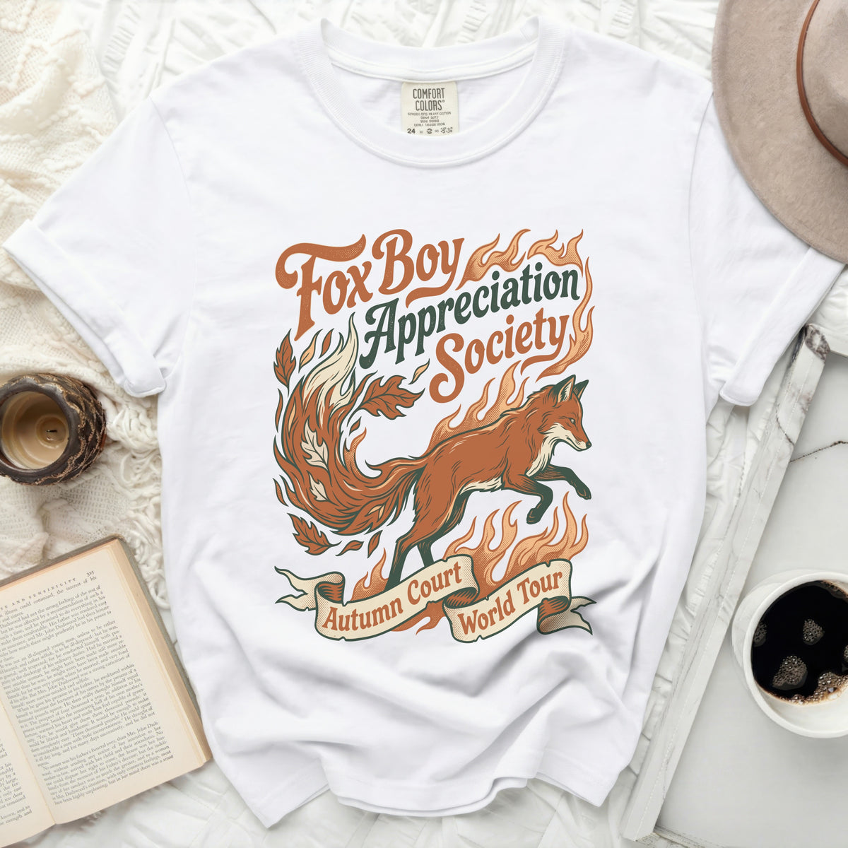 White t-shirt with "Fox Boy Appreciation Society Autumn Court World Tour" graphic.