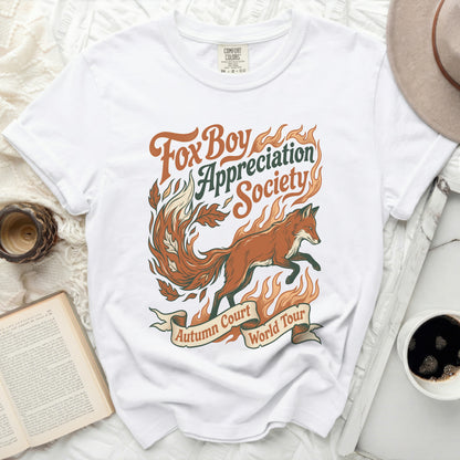 White t-shirt with "Fox Boy Appreciation Society Autumn Court World Tour" graphic.