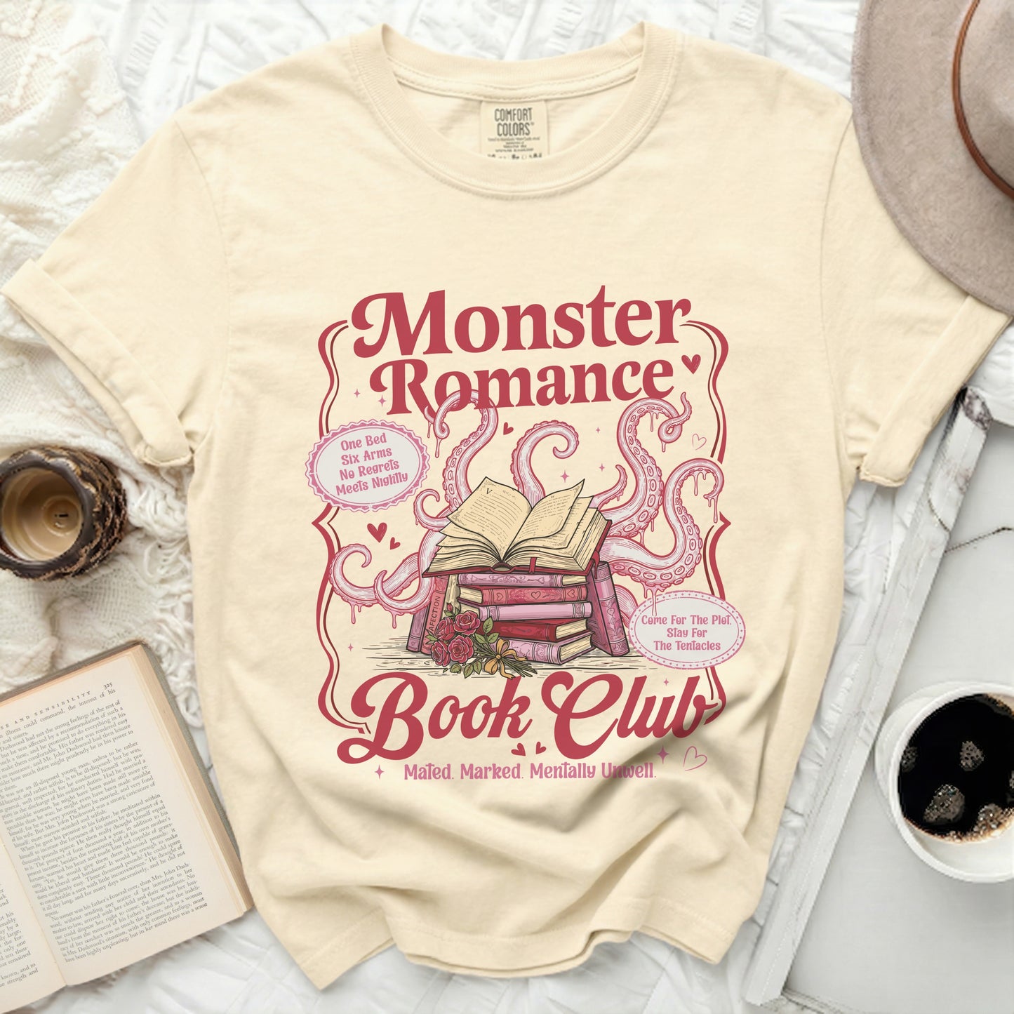 Cream t-shirt with "Monster Romance Book Club" graphic and tentacles.